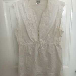 White eyelet sleeveless top.